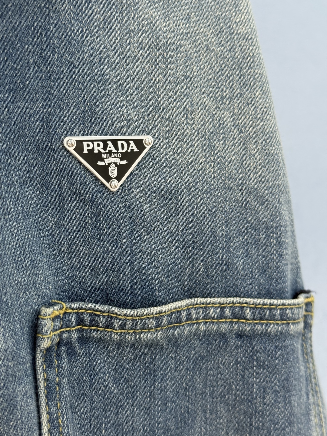 wsxc1754571756345_4 Luxury Denim Cropped Jacket with Signature Triangle Detail – Inspired by Italian Design - Image 9